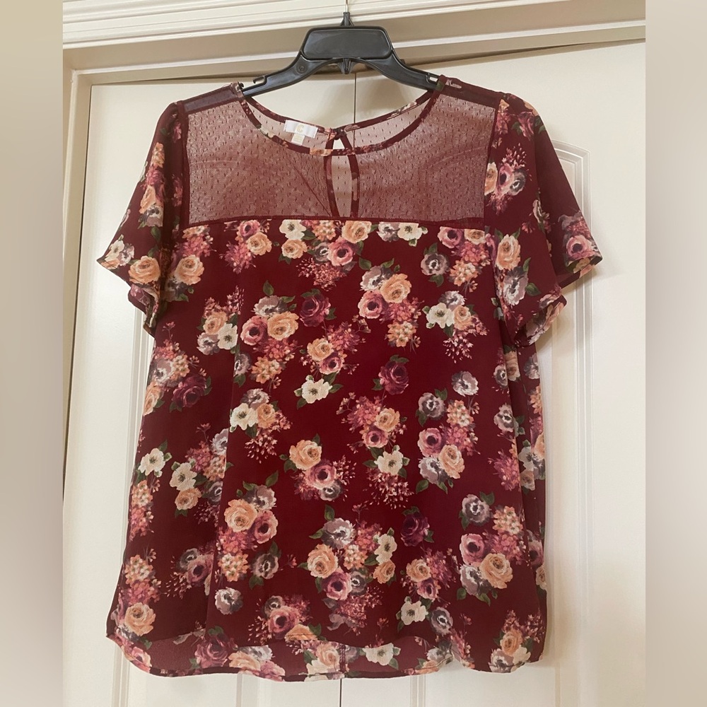 Women’s maroon floral blouse